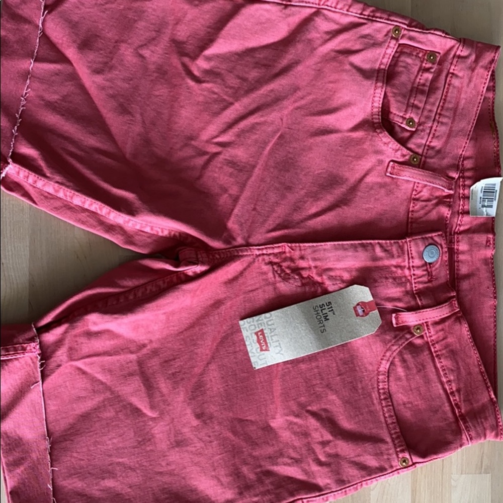 Men’s Levi’s red shorts slim fit. Size small. New-never worn